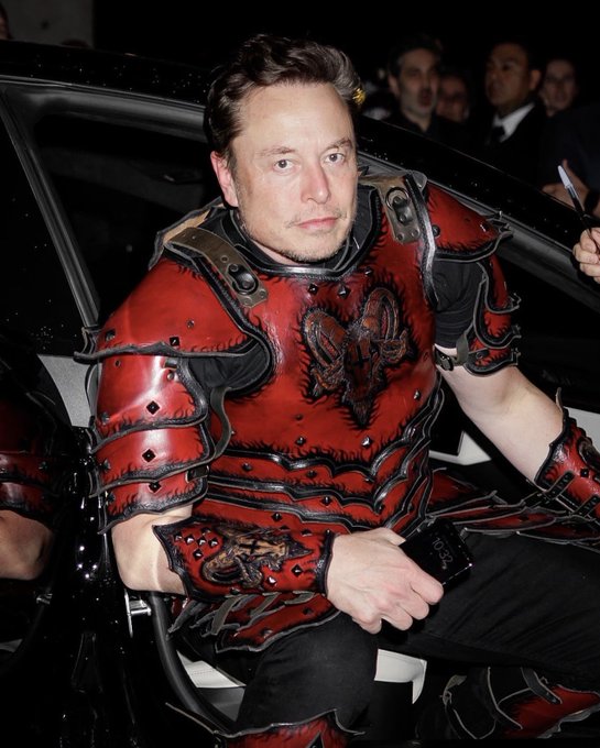 Elon Musk's Halloween celebration: Carves Twitter bird on pumpkin, makes dog wear t-shirt with logo, dresses up in red and black leather armour