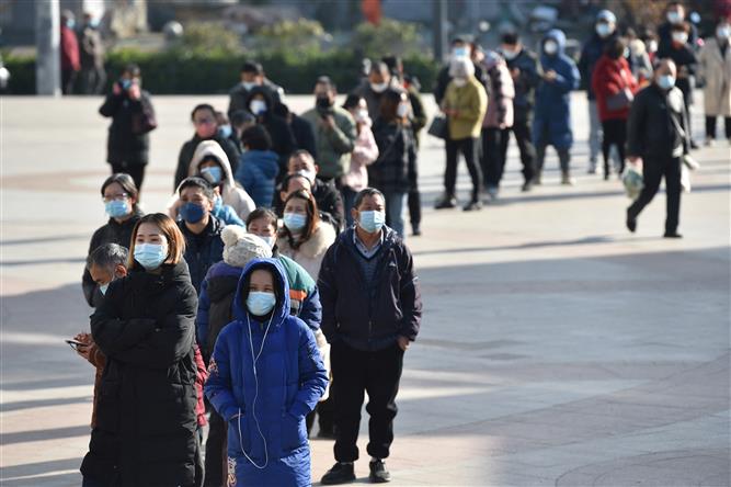 Covid-linked deaths seen in Beijing after virus rules eased